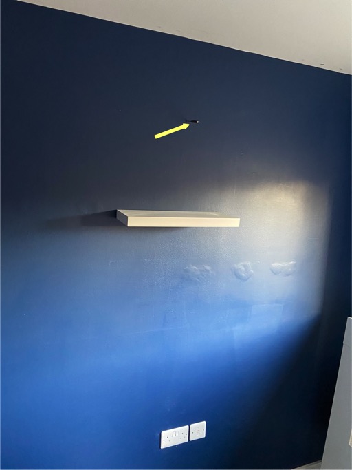 Nail in Wall, into a cable